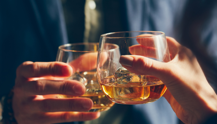 Two male drinking alochol