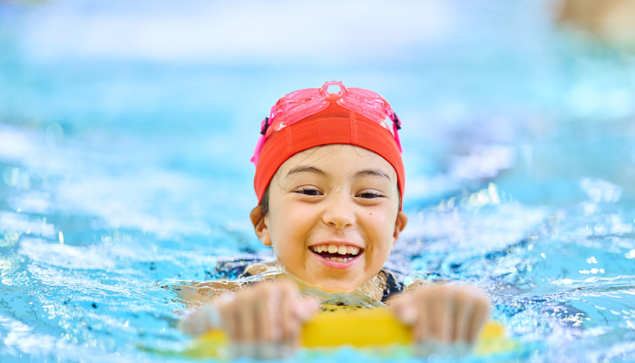 Kid learning swimming