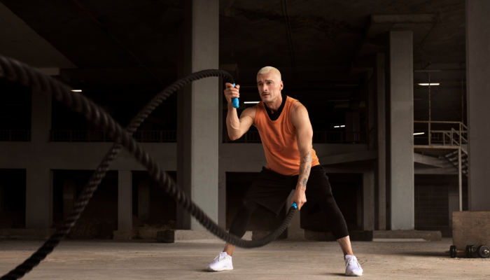A man doing hiit rope exercise 