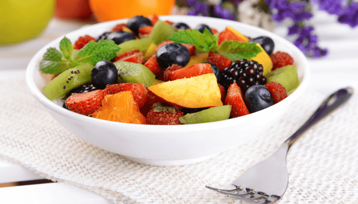 bowl of healthy fruits for glowing skin
