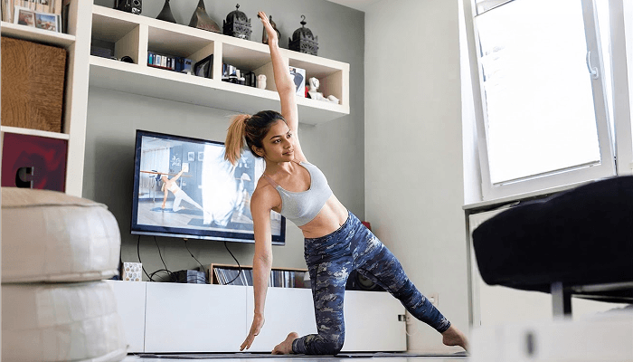 girl doing a full body HIIT workout