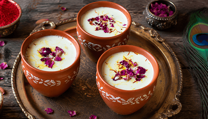 creamy thandai served in earthen pots on janmashtami